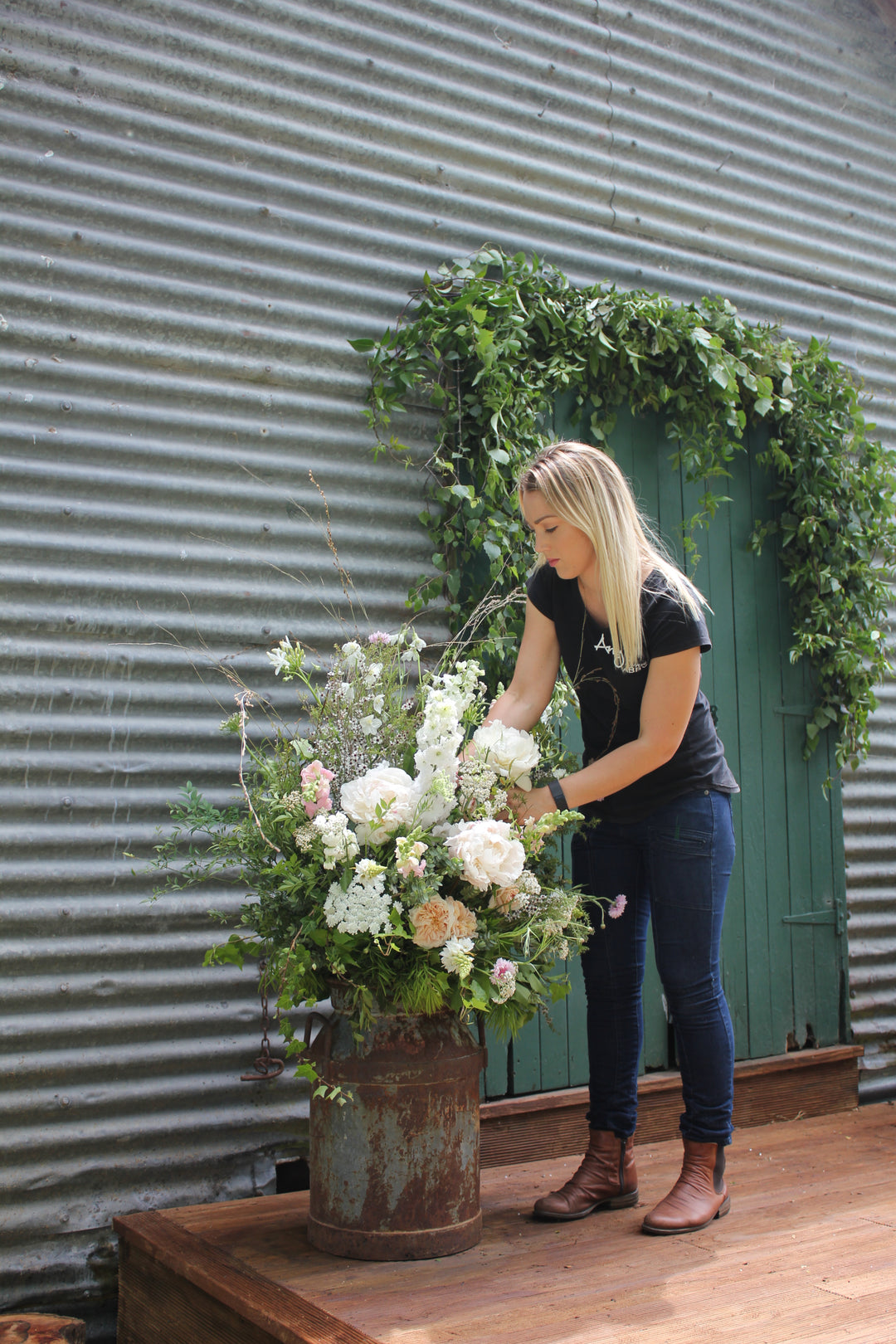 Wedding ceremony and reception flowers by Amy’s Flowers